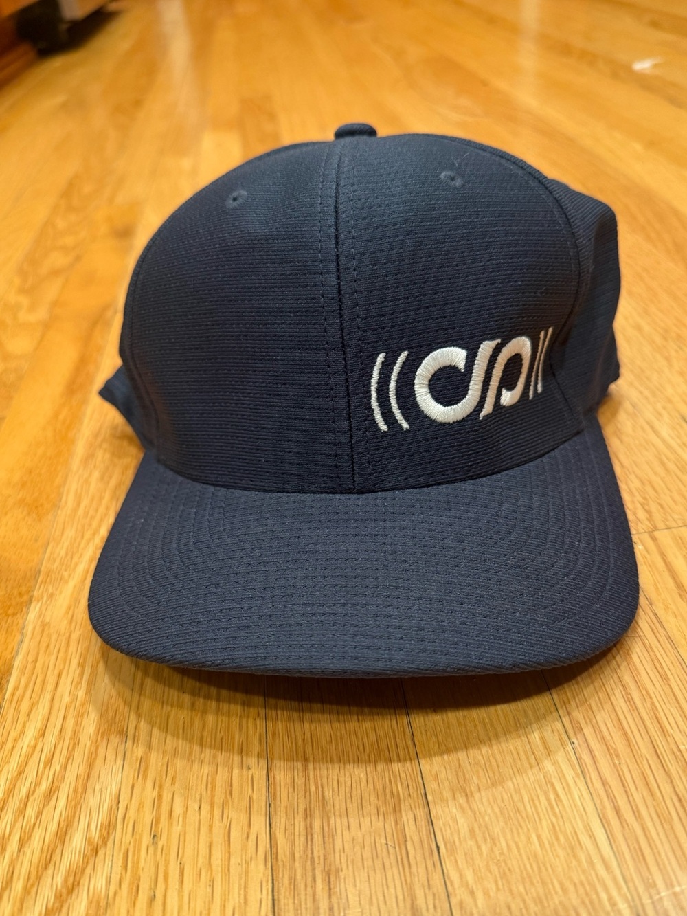 Travis Matthew Navy Baseball Cap with White Embroidered Logo